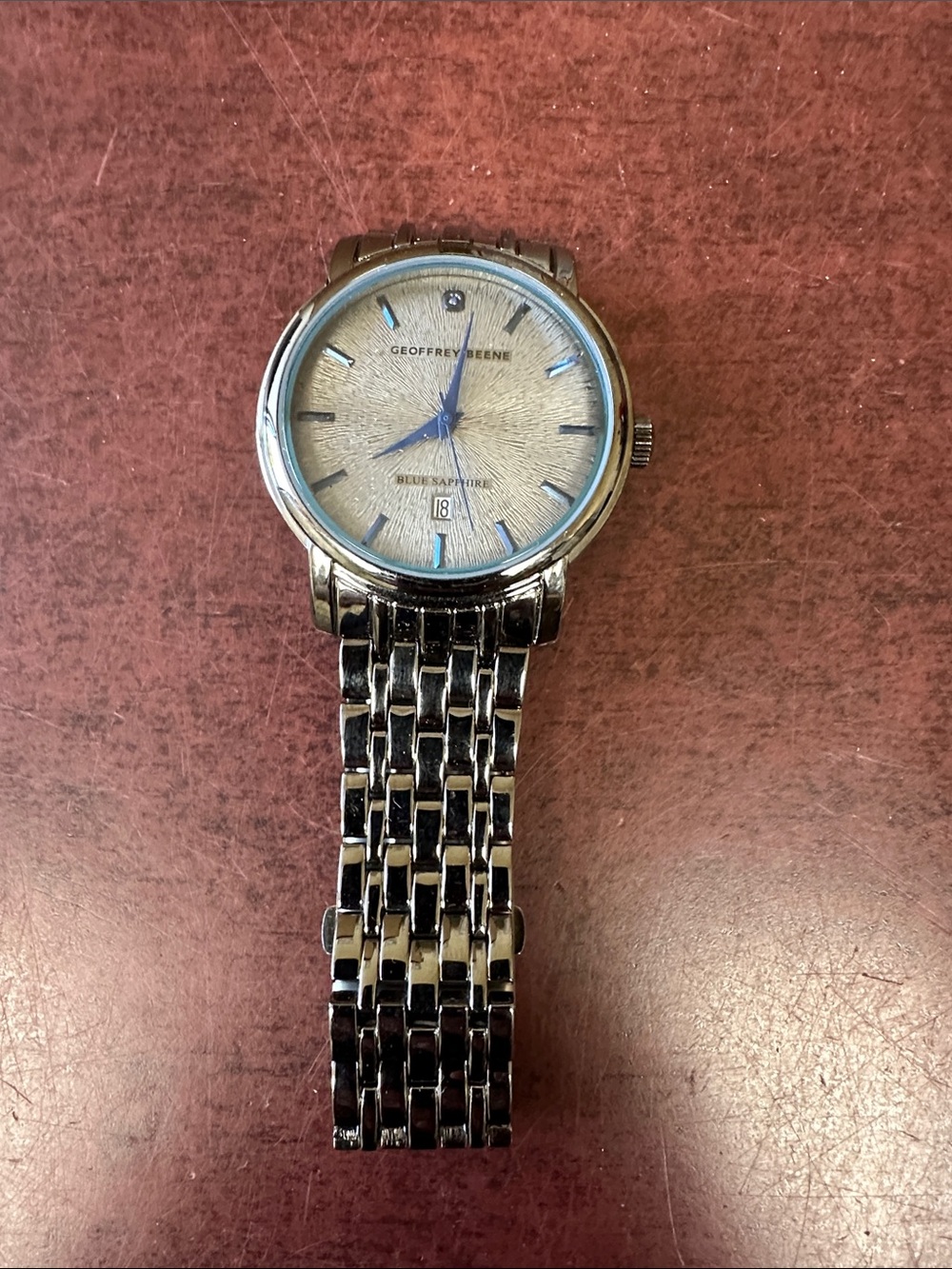 #143, Geoffrey Beene Silver Watch with Blue Accents